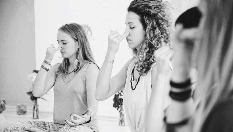Jenny Hirtz Yoflaminga demonstrating alternate nostril breathing nadi shodana